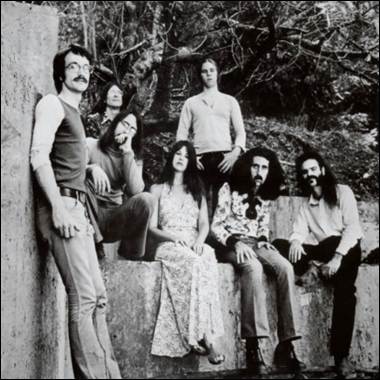 A group of people posing for a photo
Description automatically generated