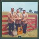 A group of men holding instruments

Description automatically generated