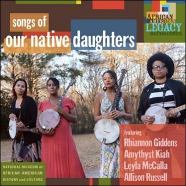 A group of women holding musical instruments

Description automatically generated