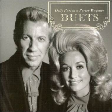 A person and person with big hair

Description automatically generated