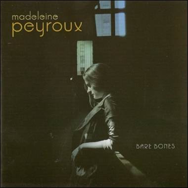 A person standing in a dark room
Description automatically generated