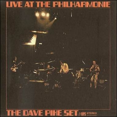 A band playing on a stage
Description automatically generated