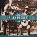 A cd cover of a person playing a guitar

Description automatically generated