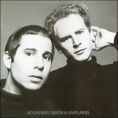 A couple of men posing for a picture

Description automatically generated
