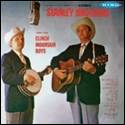 Two men playing instruments on a cover

Description automatically generated