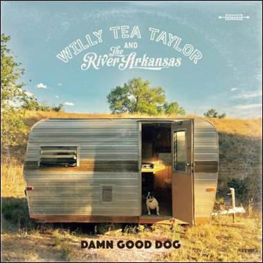 A dog standing in a trailer

Description automatically generated