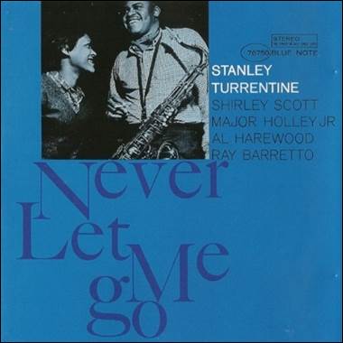 A blue cover with a couple of people

Description automatically generated