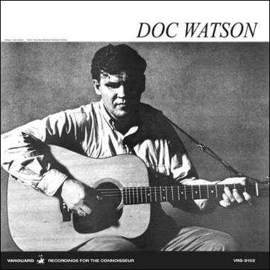 A person holding a guitar

Description automatically generated