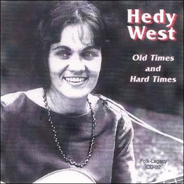 A person smiling with a guitar

Description automatically generated