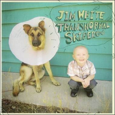 A dog and a child posing for a picture

Description automatically generated