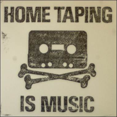 A sign with a cassette tape and bones

Description automatically generated