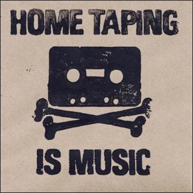 A sign with a cassette tape and bones

Description automatically generated