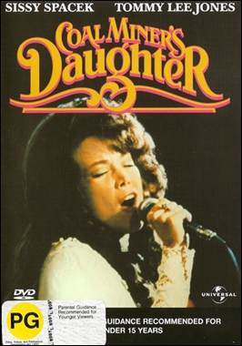 A person singing into a microphone
Description automatically generated