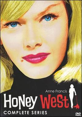 A person with blonde hair and red lipstick
Description automatically generated