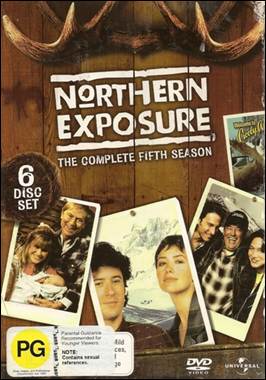 A dvd case with a group of photos
Description automatically generated