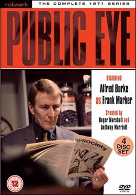 A person reading a newspaper
Description automatically generated