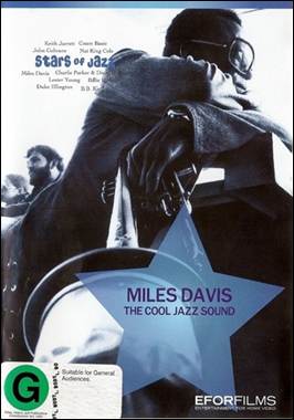 A person holding an object on a cover of a magazine

Description automatically generated