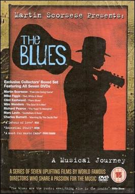 A person holding a guitar

Description automatically generated