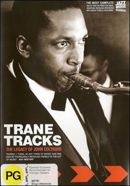 A person in a suit with a saxophone

Description automatically generated