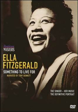 A person singing on a magazine cover

Description automatically generated