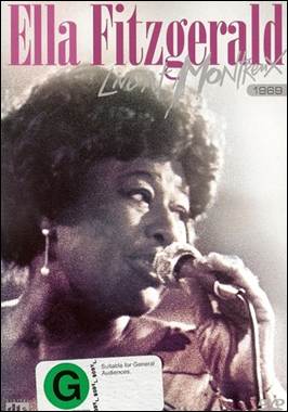 A person singing into a microphone

Description automatically generated