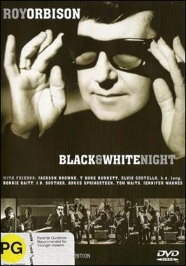 A person holding his glasses

Description automatically generated