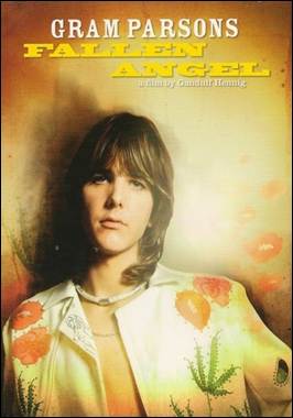 A person with long hair wearing a white shirt

Description automatically generated