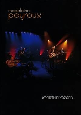 A band performing on stage

Description automatically generated