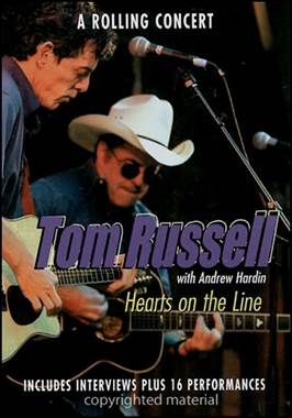 A person playing guitar with another person in cowboy hat

Description automatically generated