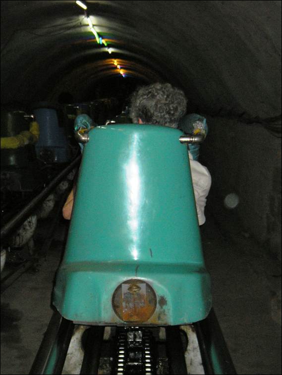 A person riding a scooter in a tunnel

AI-generated content may be incorrect.