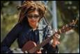 A person playing a guitar

Description automatically generated with medium confidence