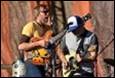 A group of men playing guitars

Description automatically generated with low confidence