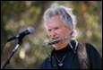 A picture containing person, microphone, outdoor, music

Description automatically generated