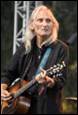 A person playing a guitar

Description automatically generated with medium confidence