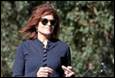 A person wearing sunglasses and a blue shirt

Description automatically generated with low confidence