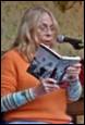 A person reading a book

Description automatically generated