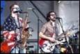 A group of people playing instruments

Description automatically generated with low confidence