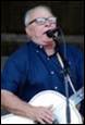 A person singing into a microphone

Description automatically generated with medium confidence