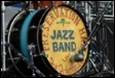 A picture containing music, musical instrument, drum, text

Description automatically generated