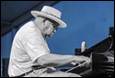 A person playing a piano

Description automatically generated with medium confidence