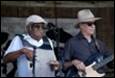 A group of men playing instruments

Description automatically generated with low confidence