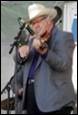 A person playing a violin

Description automatically generated with medium confidence
