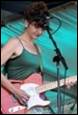 A person playing a guitar

Description automatically generated with medium confidence