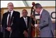 A group of men playing instruments

Description automatically generated with low confidence