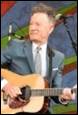 A person playing a guitar

Description automatically generated with medium confidence