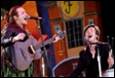 A group of people singing and playing instruments

Description automatically generated with low confidence