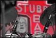 A person playing a drum set

Description automatically generated with medium confidence