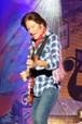 A person playing a guitar

Description automatically generated with medium confidence