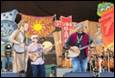A group of people playing instruments

Description automatically generated with medium confidence