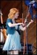 A person playing a violin

Description automatically generated